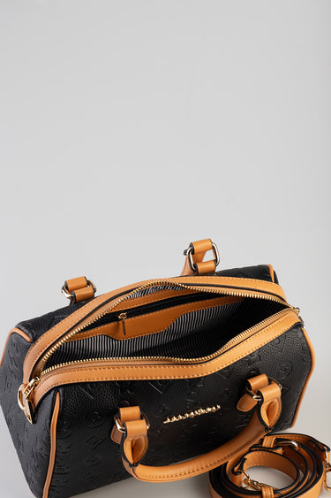 black and tan textured bowler bag by Blue Jean Traders with gold hardware, top zipper open to striped lining, short handles