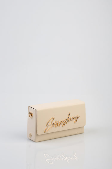 cream beige clutch bag with a gold script logo on the front and small gold hardware