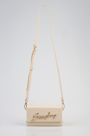 beige handbag with a long adjustable shoulder strap and a gold script logo on the front