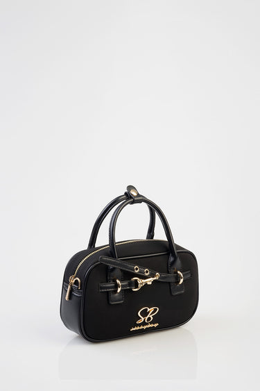 black bowler bag by Blue Jean Traders with gold hardware and front logo