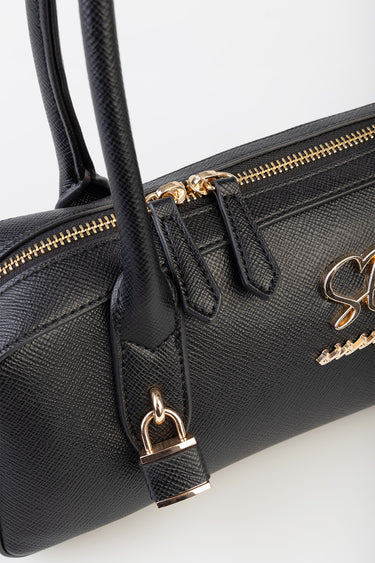 black textured leather handbag with gold zippers and hardware, top handles and a logo accent