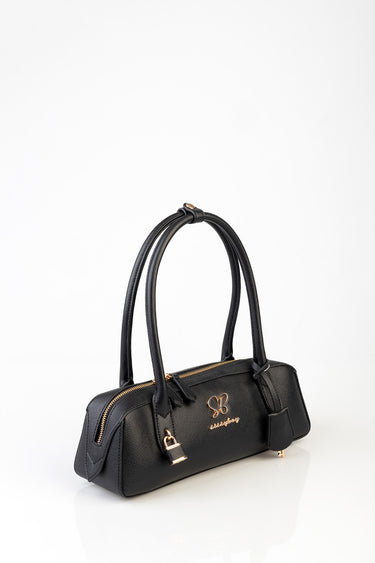 black leather shoulder bag with double top handles, gold hardware and a small lock charm by Blue Jean Traders