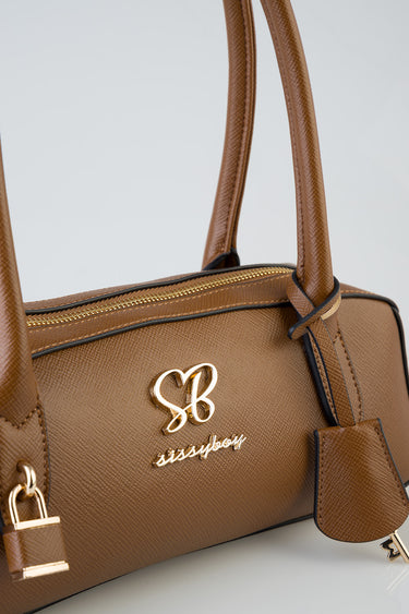brown leather shoulder bag with two top handles, gold logo initials on front, and a zip closure