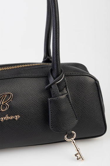 Blue Jean Traders bag in black textured leather with gold hardware, double handles and a hanging key charm.