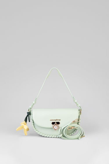 mint green Sutton bag by Blue Jean Traders with heart pendant, braided trim and yellow flower charm