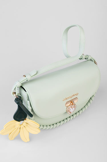mint green small shoulder bag with top handle, braided trim, gold heart clasp and yellow flower charm