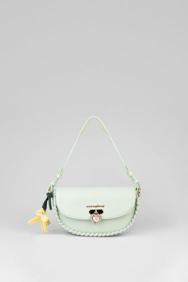 mint green shoulder bag with braided edge and heart charm, gold logo plaque