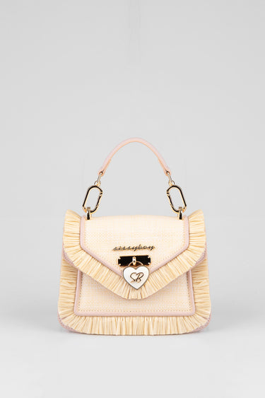 pastel pink and cream handbag with fringe trim, top handle, gold hardware, and a heart charm with initials