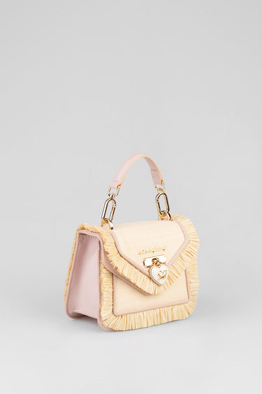 pink and beige handbag with fringe trim and gold heart lock