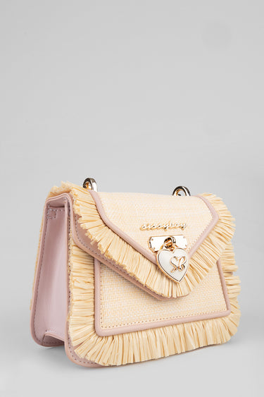 pale pink and beige fringed crossbody bag with a gold heart lock and stitched edges