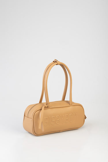 tan leather bowler bag with two top handles and embossed letters on the side