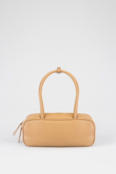 tan leather bowler bag with double top handles and a zip closure