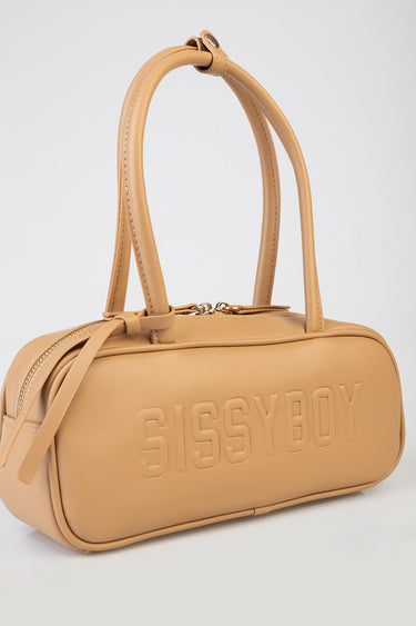 tan leather bowler bag with two top handles and embossed sissyboy lettering on the side, gold hardware