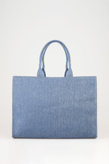 blue denim tote bag with two rounded handles on a white background