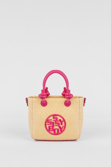 straw tote bag with pink handles and circular logo patch on front