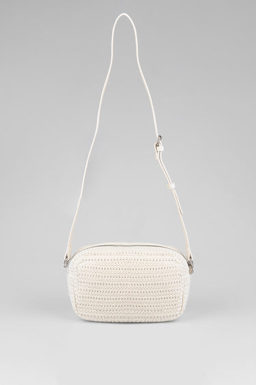cream crochet crossbody bag with long strap and metal hardware