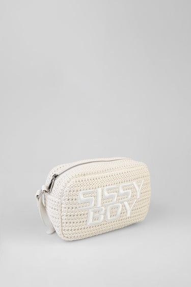 cream crochet bag with a top zipper and large white letters reading Sissy Boy