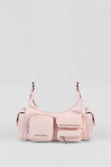 pink handbag with multiple front pockets including zippered pocket and flap pocket and an adjustable shoulder strap