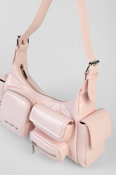 pink bag with multiple zip pockets and an adjustable strap