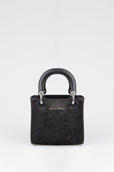 black mini bag with floral embroidery and silver ring hardware, two top handles