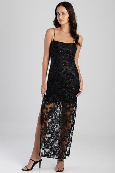 Blue Jean Traders black lace maxi dress with spaghetti straps and sheer floral overlay.