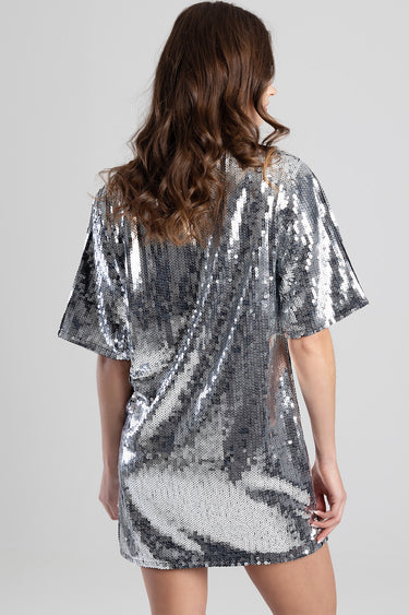 back view of a silver sequin t shirt dress with wide short sleeves