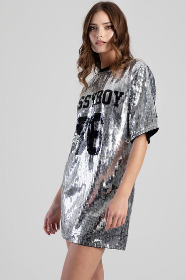 silver sequin short sleeve t shirt dress with bold black lettering across the front