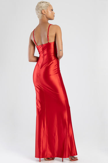back view of red satin corset dress with thin straps and a long fitted skirt, zipper along the back