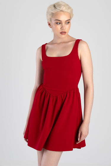 Blue Jean Traders red sleeveless mini dress with a scoop neck and gathered waist