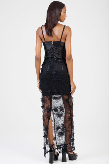 woman wearing blue jean traders black satin bodice with floral lace overlay, back view shows zipper and sheer lace skirt