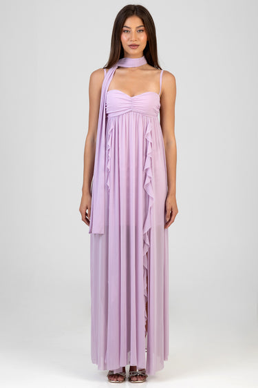 woman in lavender maxi dress with ruched bust, halter straps and long scarf around neck, cascading ruffle details along front