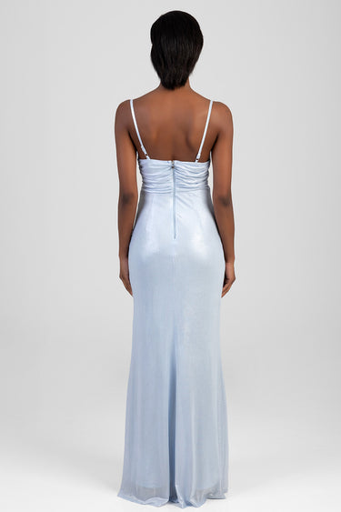 back view of a woman wearing a light blue satin maxi dress with skinny straps, ruched bodice and a center back zipper