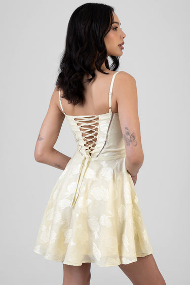 cream floral jacquard mini dress with a lace up back and thin spaghetti straps, by blue jean traders