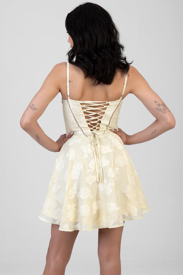 cream lace mini dress with floral pattern, thin straps and lace-up back