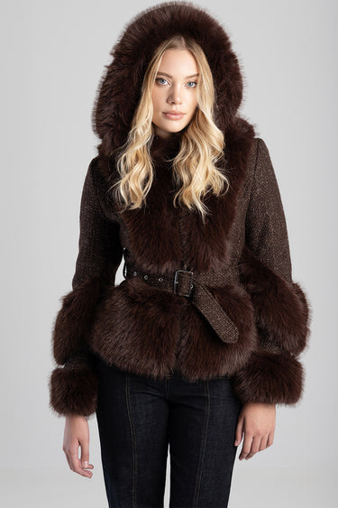 woman in a dark brown faux fur hooded jacket with a matching belt and fluffy cuffs