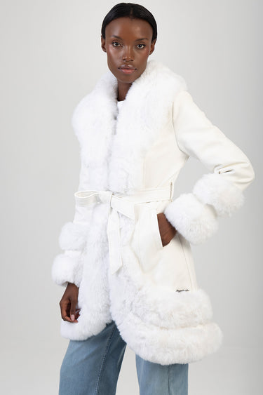 white faux fur trimmed belted coat with large fur collar and cuffs on a model