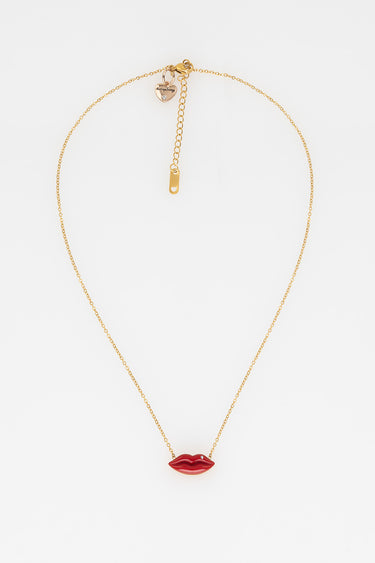 gold tone lip pendant necklace with adjustable chain and tiny heart charm