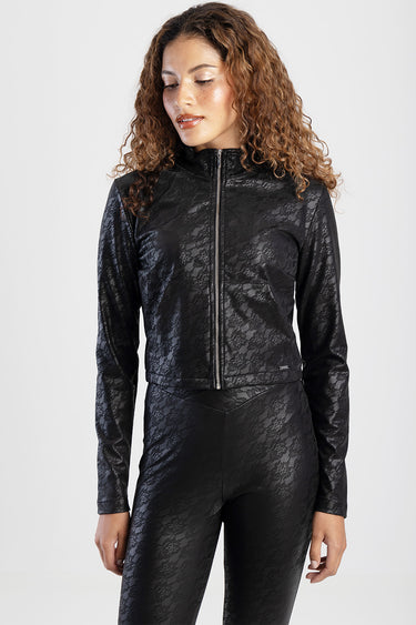 woman wearing a black lace track jacket with a full front zipper and a high collar