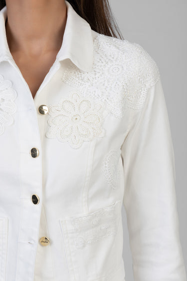 white denim jacket with floral lace embroidery on shoulder and chest, gold buttons, front pockets