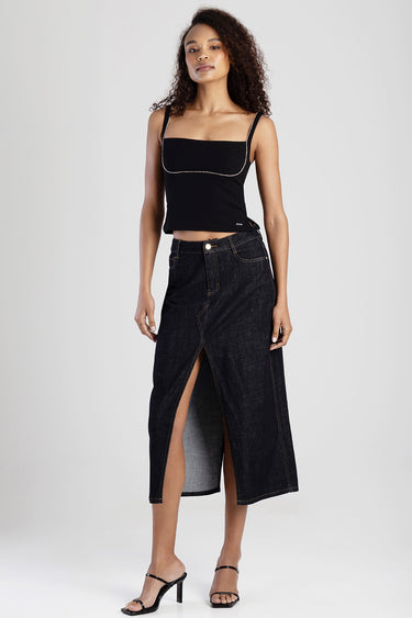 model wearing black cropped top and dark denim midi skirt with front slit by Blue Jean Traders
