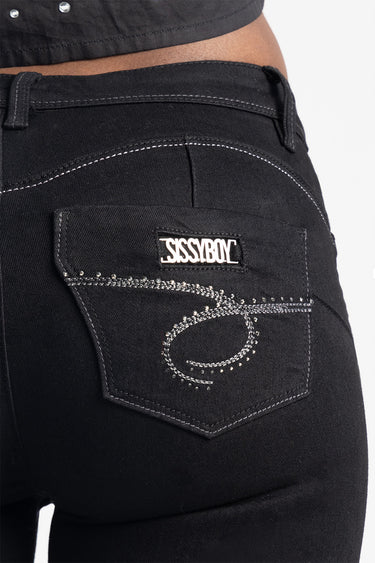 black denim jeans with white contrast stitching and rhinestone embellishments on the back pocket; sissyboy label.