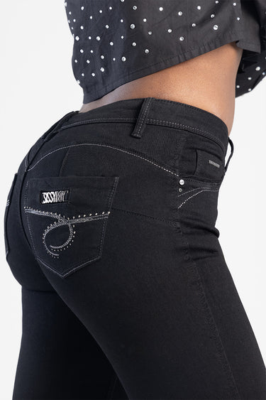 black jeans with rhinestone embellishment on back pocket and contrast stitching