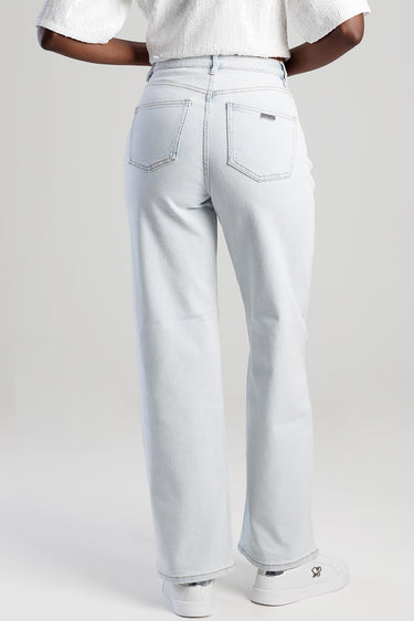 back view of light blue denim wide leg jeans by Blue Jean Traders showing two back pockets and a small logo tag