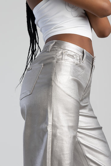 metallic silver pants with belt loops and pockets, paired with a white crop top