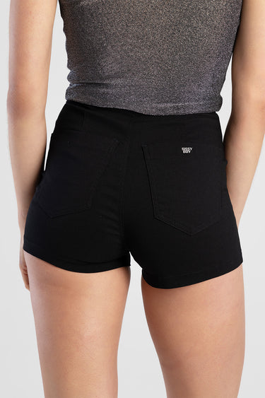 woman wearing black high waist shorts with back pockets and a small logo on the right rear pocket