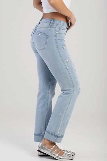 light wash straight jeans with rhinestone embellishments along the leg and a visible back pocket, cuffed hems