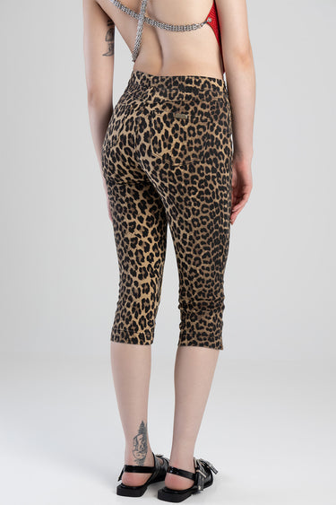 back view of a person wearing leopard print capri jeans with two back pockets and belt loops by Blue Jean Traders