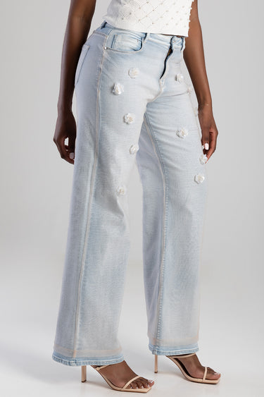 blue wide leg jeans with light wash and white floral appliques