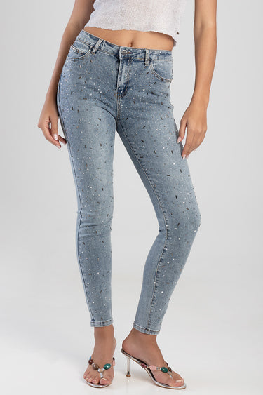Blue Jean Traders skinny jeans in light blue denim with paint splatter pattern on a model