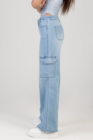 blue jean traders wide leg cargo jeans on a model, side view showing large cargo pocket and back pocket